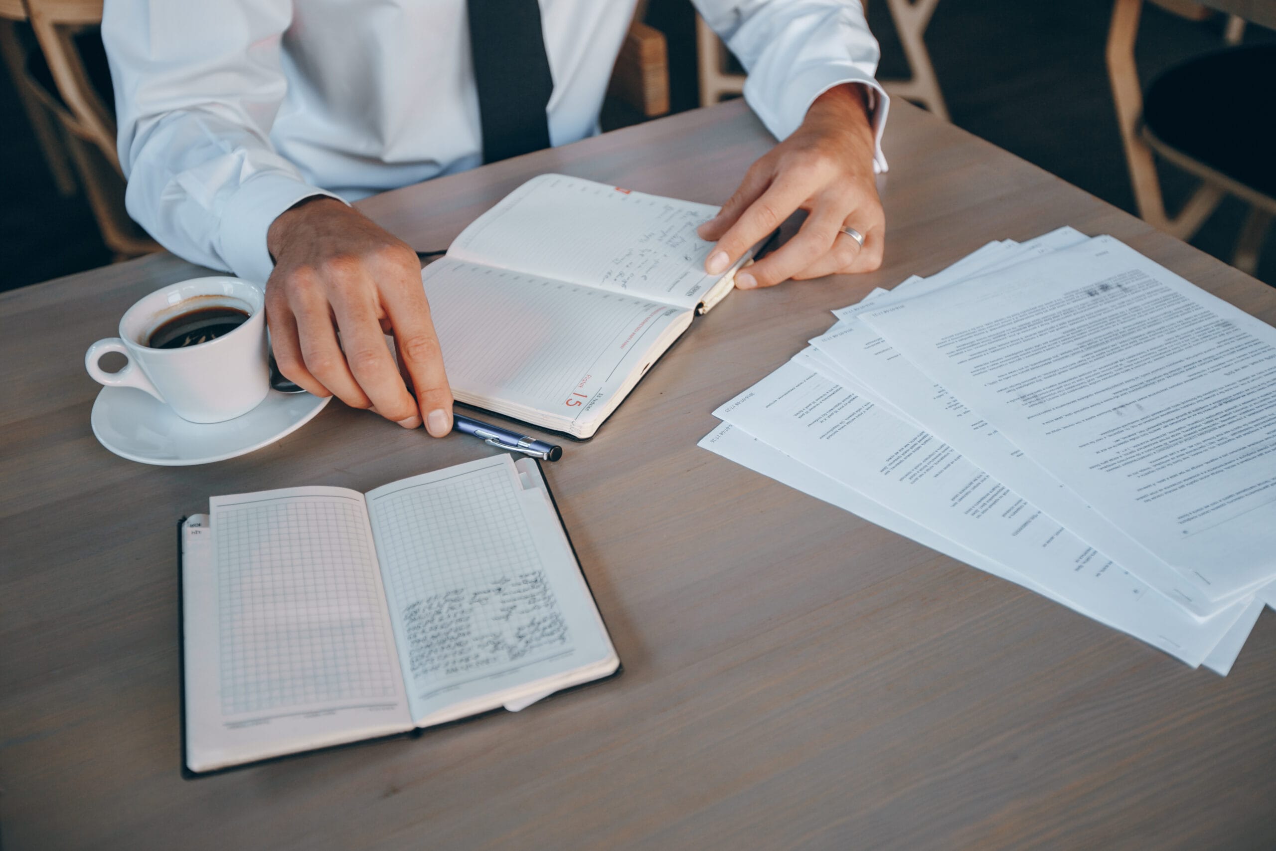 Startup founder reviewing legal documents and growth plan to structure equity and IP for long-term funding